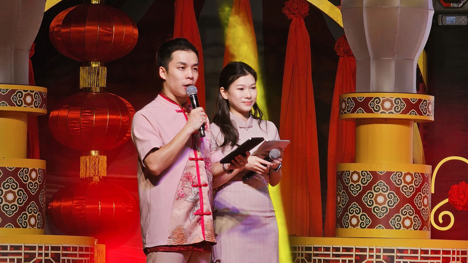 JC Cheah on stage at a corporate event